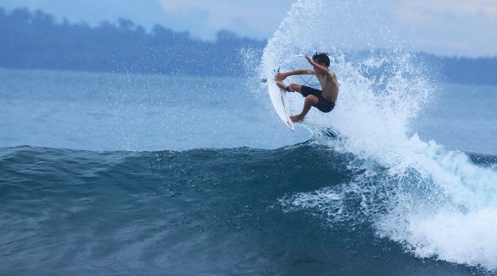 Touma Cameron getting air on Mentawai trip