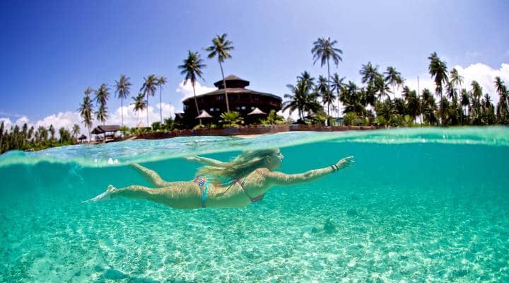 Swimming at Macaronis Resort, Mentawais